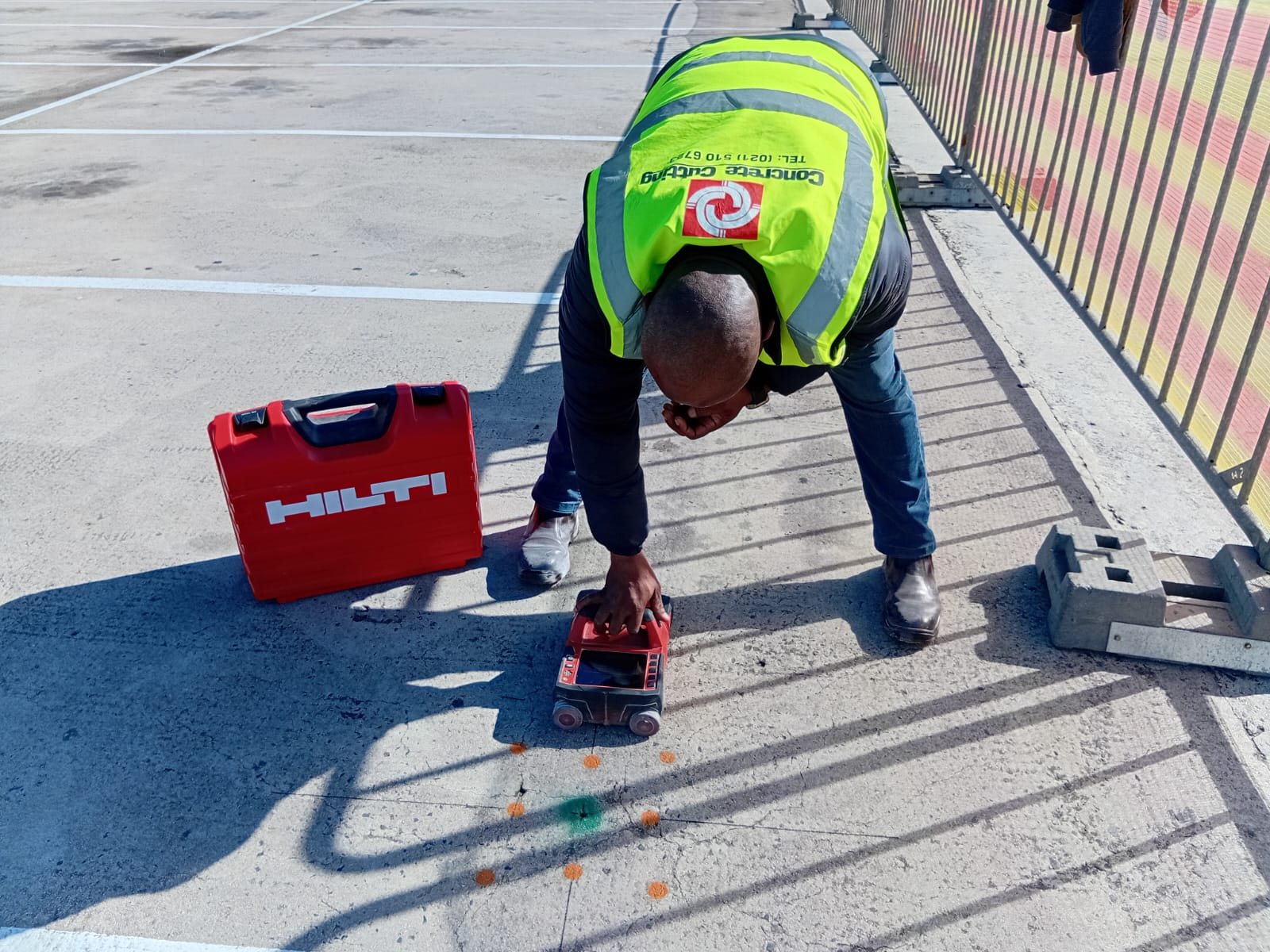 CCS technician scanning a concrete slab with Hilti radar equipment